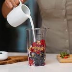 OVENTE Immersion Electric Hand Blender 300 Watt Power 2 Mix Speed with Stainless Steel Blades, Handheld Stick Mixer Set with Egg Whisk Attachment Mixing Beaker and BPA-Free Food Chopper, Red HS565R - Image 9